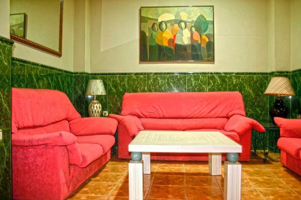 Hostal La Casa De Enfrente Malaga Bagian luar foto